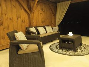 A seating area at Kiscsermely Vendégház