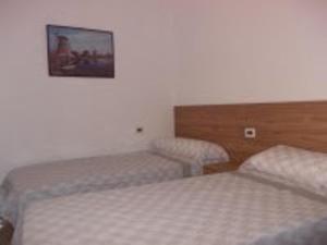 Postel nebo postele na pokoji v ubytování Piles - Apartment - Sleeps 7 - Parking - Seafront
