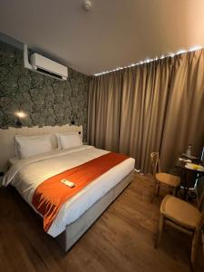 Postel nebo postele na pokoji v ubytování Hôtel Maison Demelenne