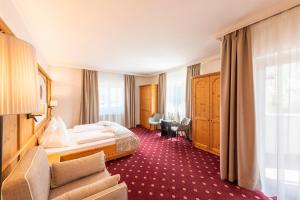 Voodi või voodid majutusasutuse Hotel Rosskopf toas