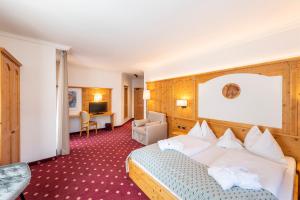 Voodi või voodid majutusasutuse Hotel Rosskopf toas
