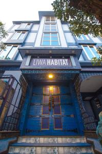a building with a sign that reads la habiliana at Liwa Habitat in Bangalore