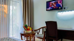 A television and/or entertainment centre at Millsview Hotels in Kisumu