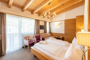 Voodi või voodid majutusasutuse Hotel Rosskopf toas