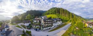 an aerial view of a town on a mountain at Panoramahotel Gürtl in Haus im Ennstal