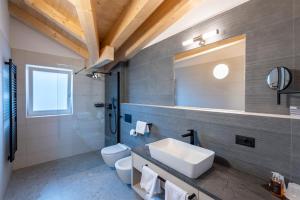 Vannituba majutusasutuses Hotel Rosskopf