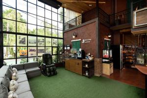 Botanic Service Room at Impact Muangthongthani - SHA Certified的休息区