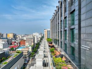 a view of a city from a building at Jeju Central City Hotel in Jeju