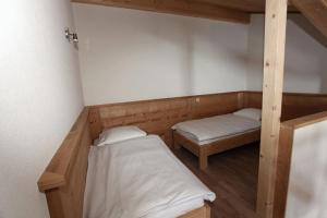 Postelja oz. postelje v sobi nastanitve Helvetia hotel