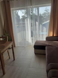 Posedenie v ubytovaní Apartament na Wydmach