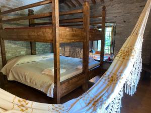 Postel nebo postele na pokoji v ubytování Borgo Corniola B&B Naturista