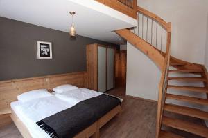 Postelja oz. postelje v sobi nastanitve Helvetia hotel