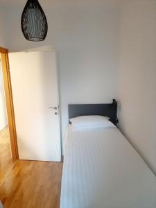 Postel nebo postele na pokoji v ubytování Maximus 2