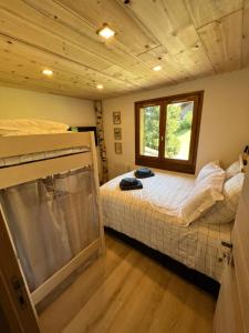Posteľ alebo postele v izbe v ubytovaní Le Sapin B19 Megeve - Demi Quartier