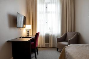 Letto o letti in una camera di Elite Stora Hotellet Linköping