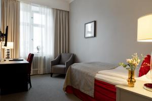 Letto o letti in una camera di Elite Stora Hotellet Linköping