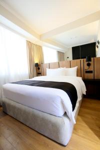 Katil atau katil-katil dalam bilik di Genesis Kosher Hotel Tbilisi