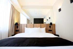 Katil atau katil-katil dalam bilik di Genesis Kosher Hotel Tbilisi