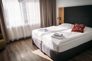 Postel nebo postele na pokoji v ubytování Landgasthof-Wemmer