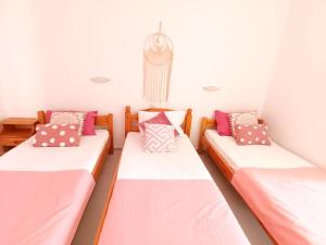 A bed or beds in a room at Lecini Studios with Pool, by ZanteWize