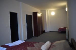 Letto o letti in una camera di Hotel Begić