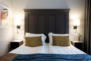 Letto o letti in una camera di Elite Stora Hotellet Linköping
