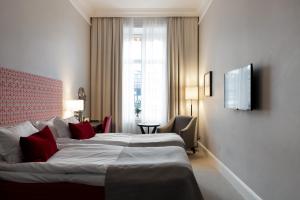 Letto o letti in una camera di Elite Stora Hotellet Linköping