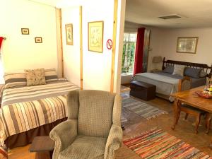 Ένα ή περισσότερα κρεβάτια σε δωμάτιο στο Serenity Guesthouse
