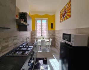 Köök või kööginurk majutusasutuses APT Re di Roma