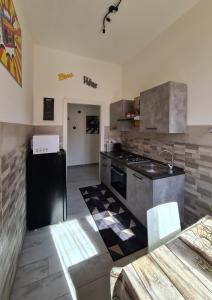 Köök või kööginurk majutusasutuses APT Re di Roma