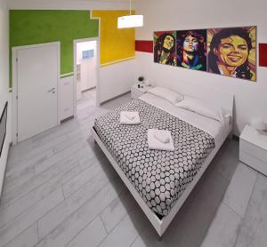Voodi või voodid majutusasutuse APT Re di Roma toas