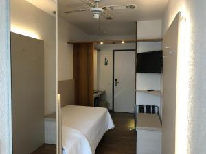 Voodi või voodid majutusasutuse Hotel Campione toas
