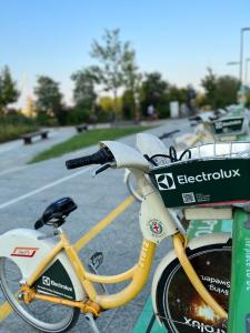a bike parked on the side of a street at Sweet Home in Milano smart district in Milan