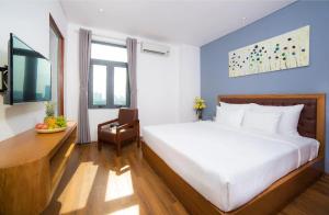 Hai Trieu Hotel客房内的一张或多张床位