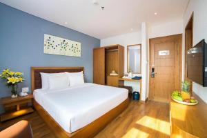Hai Trieu Hotel客房内的一张或多张床位