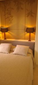 A bed or beds in a room at Cokkinis villa with garden overlooking the sea