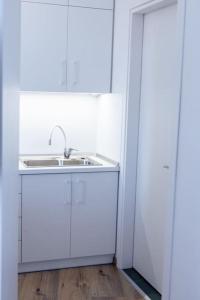 Kuchyň nebo kuchyňský kout v ubytování Cozy Studio Komotini