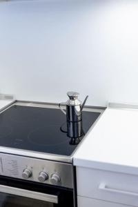 Kuchyň nebo kuchyňský kout v ubytování Cozy Studio Komotini