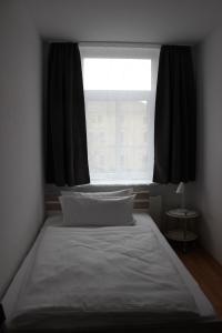 Postel nebo postele na pokoji v ubytování City-Appartement 3.2.