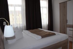 Postel nebo postele na pokoji v ubytování City-Appartement 3.2.