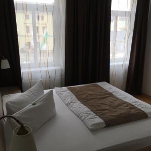 Postel nebo postele na pokoji v ubytování City-Appartement 3.2.