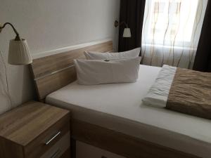 Postel nebo postele na pokoji v ubytování City-Appartement 3.2.