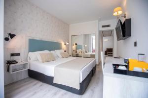 Posteľ alebo postele v izbe v ubytovaní Soho Boutique Bahía Málaga