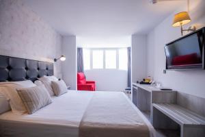 Posteľ alebo postele v izbe v ubytovaní Soho Boutique Bahía Málaga