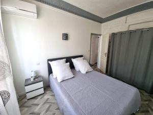 Posteľ alebo postele v izbe v ubytovaní Bel appartement 2 chambres climatisé centre ville