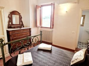 Posteľ alebo postele v izbe v ubytovaní Chianti Craft House Badia a Passignano