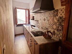 Kuchyňa alebo kuchynka v ubytovaní Chianti Craft House Badia a Passignano