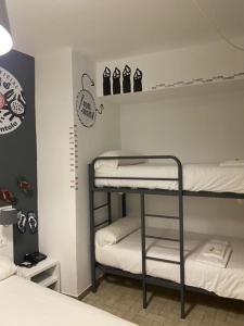 Postel nebo postele na pokoji v ubytování Hotel Bayona