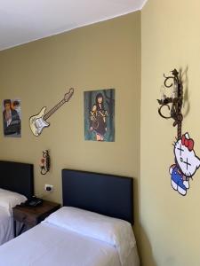 Postel nebo postele na pokoji v ubytování Hotel Bayona