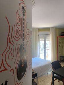 Postel nebo postele na pokoji v ubytování Hotel Bayona